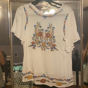 White boutique embroidered top